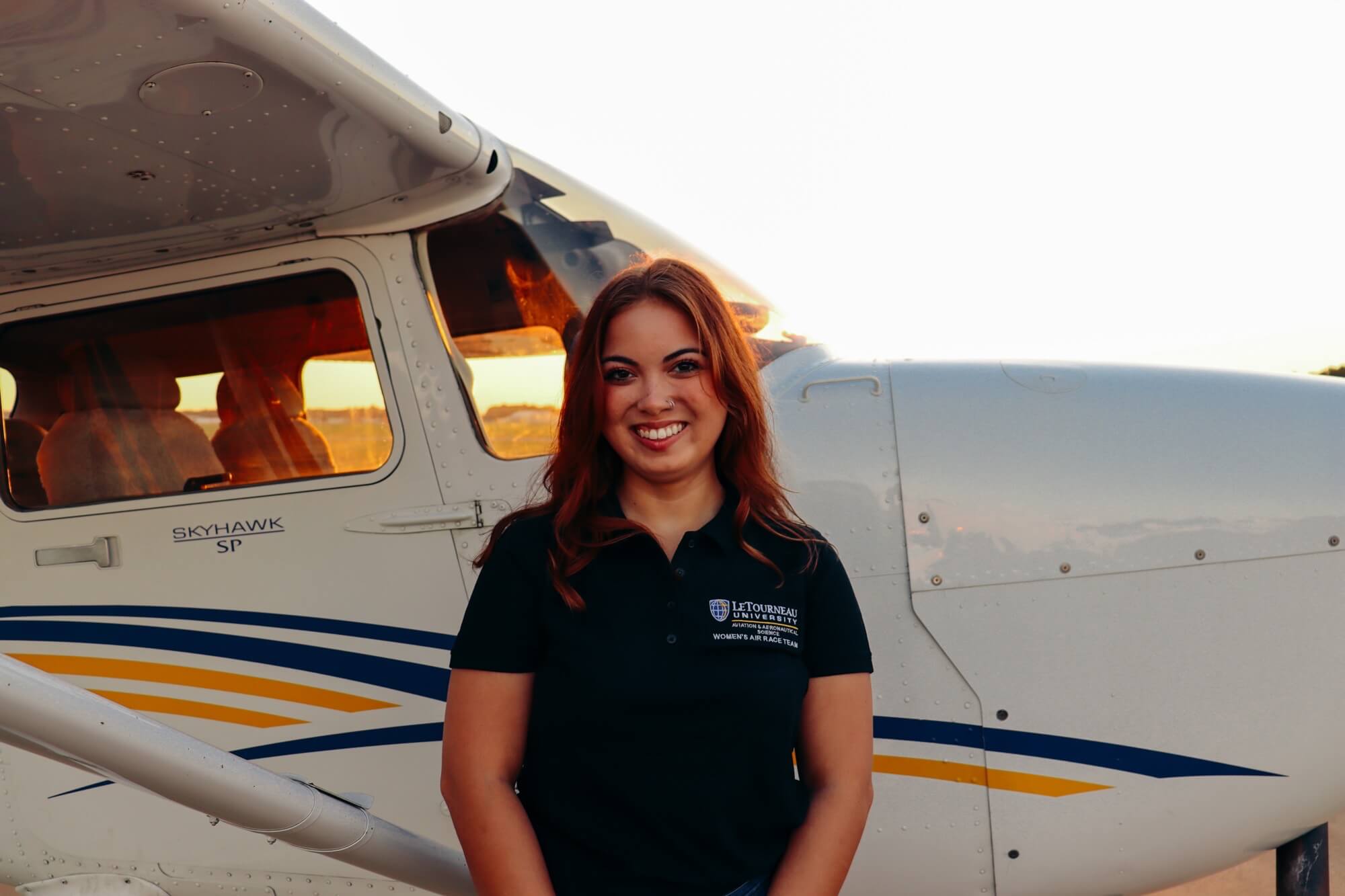 woman by plane