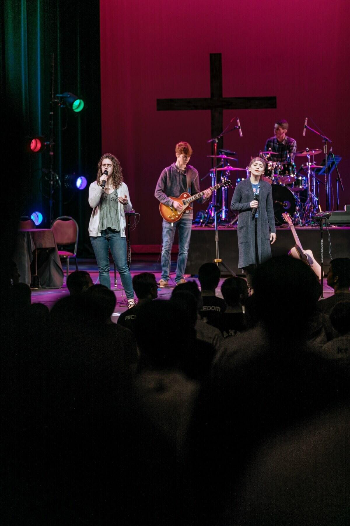 The chapel band leads worship.